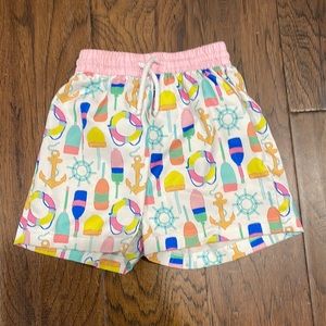 Little boy nautical swim trunks.